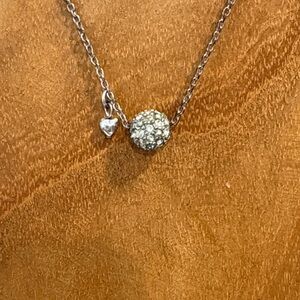 AE Silver tone charm necklace with pavé ball & heart charm. Adj length.